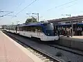 A train discharges passengers at Alsancak station, on opening day.
