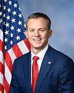 Upper-body portrait of a twentyfirst-century man in a suit.