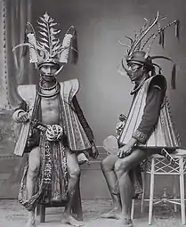 Two men in war attire, South Nias.