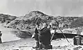 John Raffles Cox taking latitude with sextant at harbour at Cape Barrow