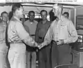 Rear Admiral Felix B. Stump (right) with Rear Admiral Calvin T. Durgin, 1945.