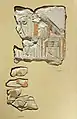 Fragments of a relief depicting Kheti sitting in an armchair under an elaborate canopy