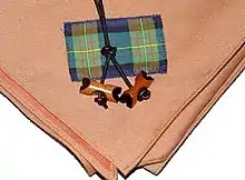 Image 28Wood Badge beads and neckerchief. Wood Badge is the premier Boy Scout adult leader training course. A holder of the Wood Badge is a leader highly trained and dedicated Scout leader.