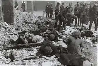 NARA copy #13, IPN copy #16Jews pulled from a bunkerNowolipie 64 / Smocza 1 intersection