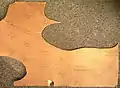 Vintage Texon 480 insole board offcut showing direction of cut-outs where shoe insole patterns have been placed