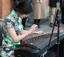 Image 2Guzheng, a type of Chinese instrument. (from Chinese culture)
