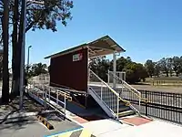 Small platform with metal shelter