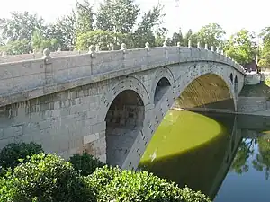 The Anji Bridge in Zhao County in Hebei Province, China is said to be an inspiration for the pedestrian bridge.